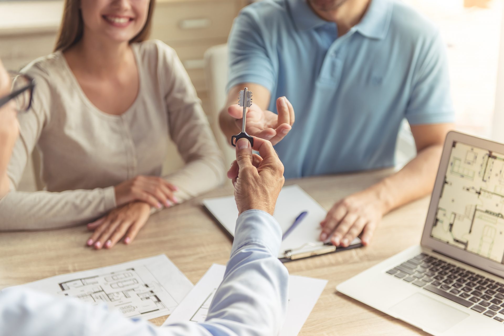 Couple visiting realtor